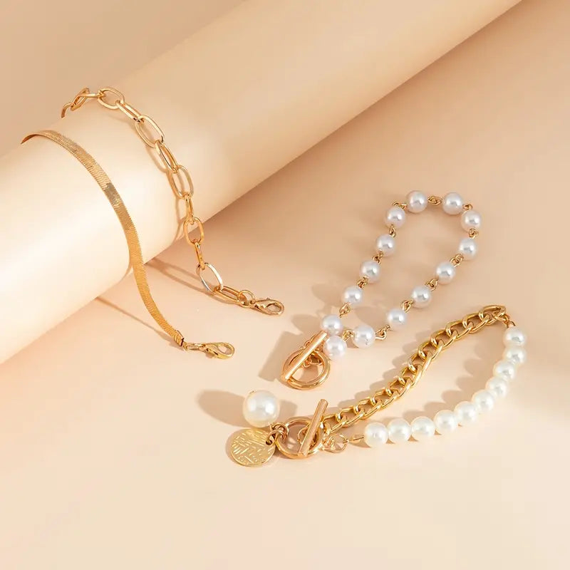 Amie Set of 4 Chic Gold Bracelets – Snake, Pearls, and Links | Gold